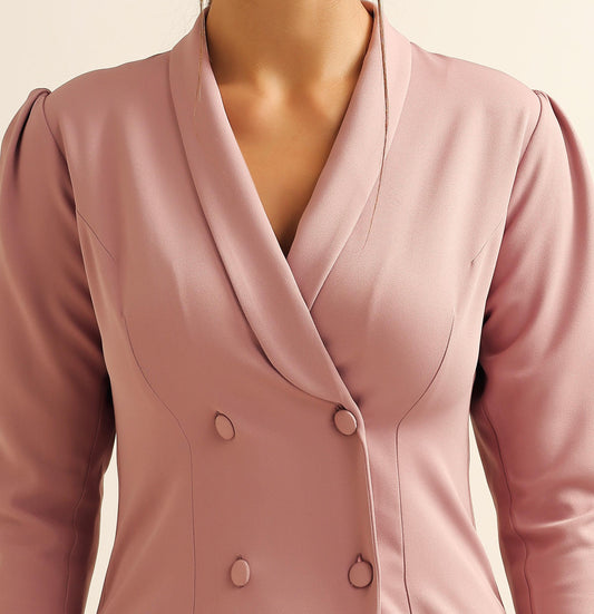 Close-up of dusty rose blazer dress showing double breasted buttons and lapel detail