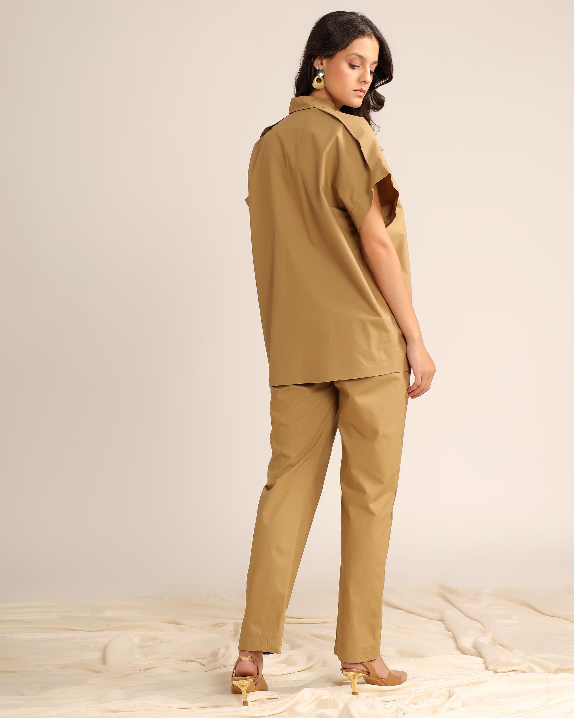 Back view of khaki co-ord set with relaxed shirt top and straight fit pants for women