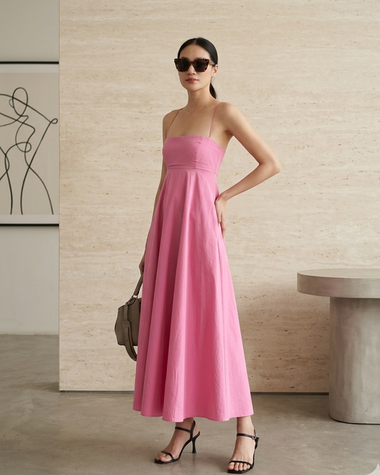 Side view rose pink cotton dress spaghetti straps showing fitted bodice and flared skirt